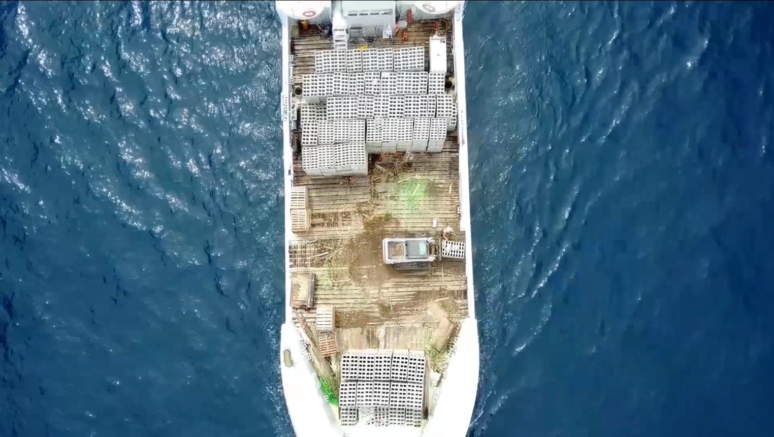 Boat carrying concrete ties for artificial reef